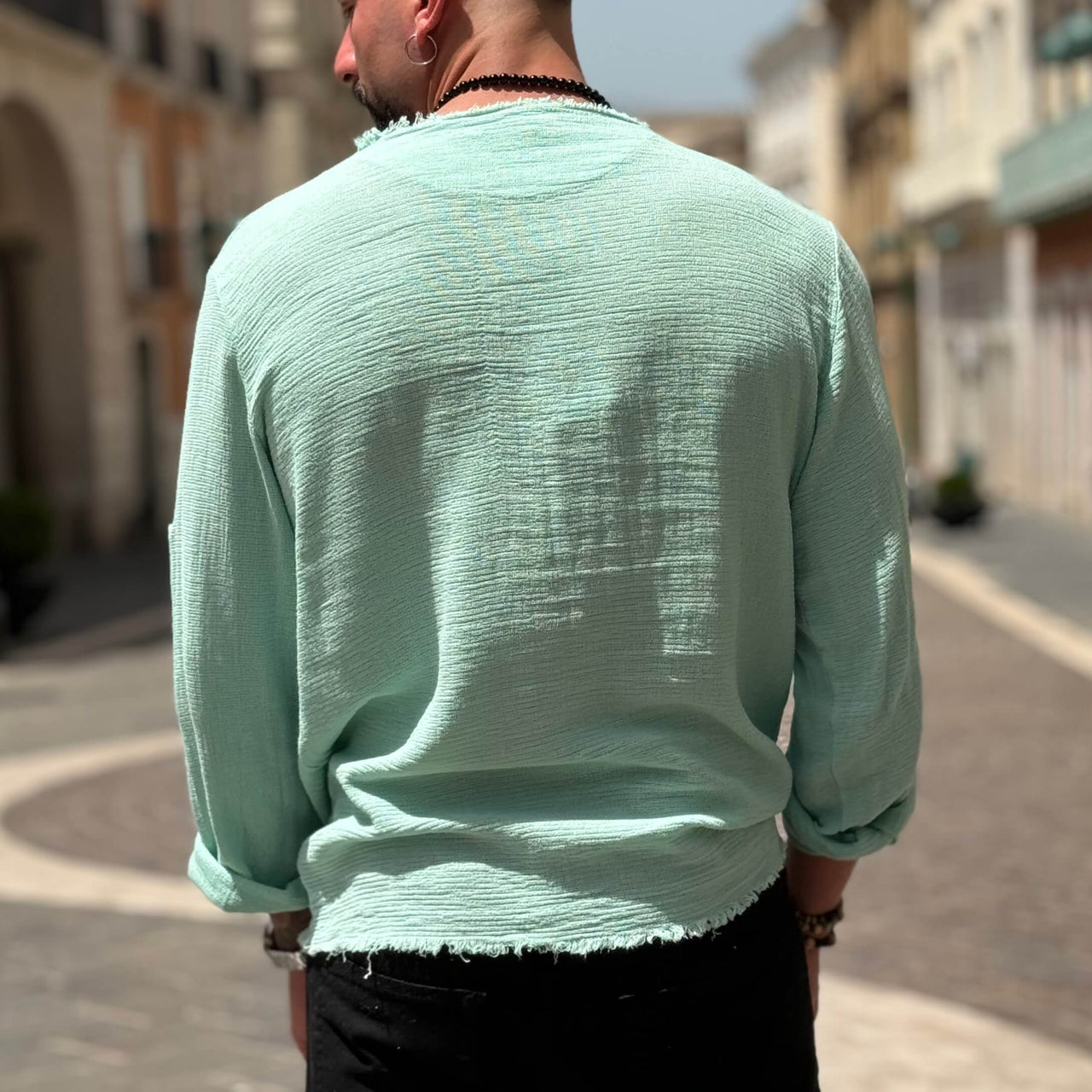 Maglia verde acqua in filo con collo sfrangiato - FLAG STORE